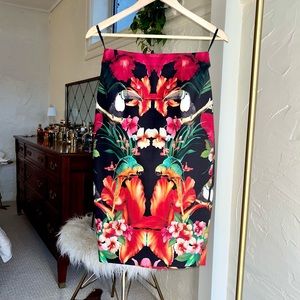 Ted Baker knee length skirt with red green contrasting pattern and gold zipper